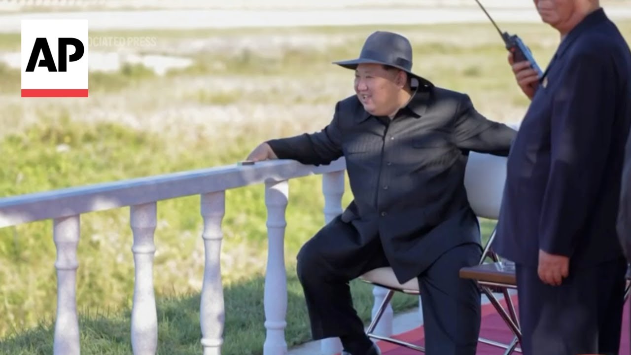 North Korean state media show Kim Jong Un inspecting drone and missile exercises